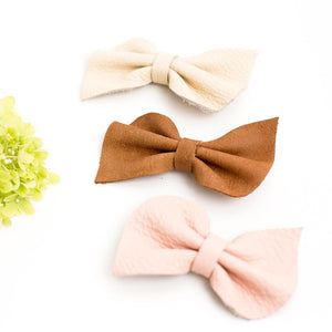 Leather fan bow on clip - rose blush