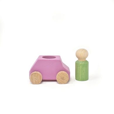 Pink wooden car with green figure