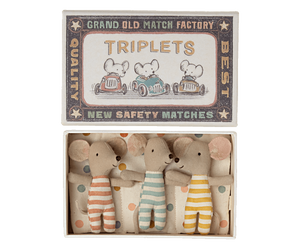 Baby triplets in a box